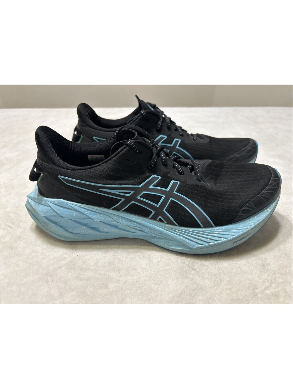 Asics Novablast 4 Mens Size 10.5 Black Blue Athletic Running Shoes Sneakers